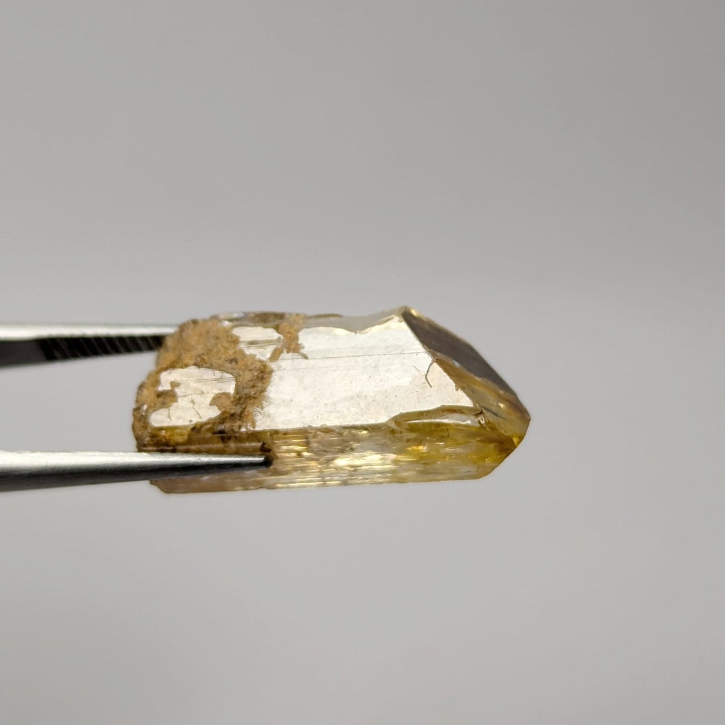 Topacio Imperial En bruto Natural 20 mm x 7 mm