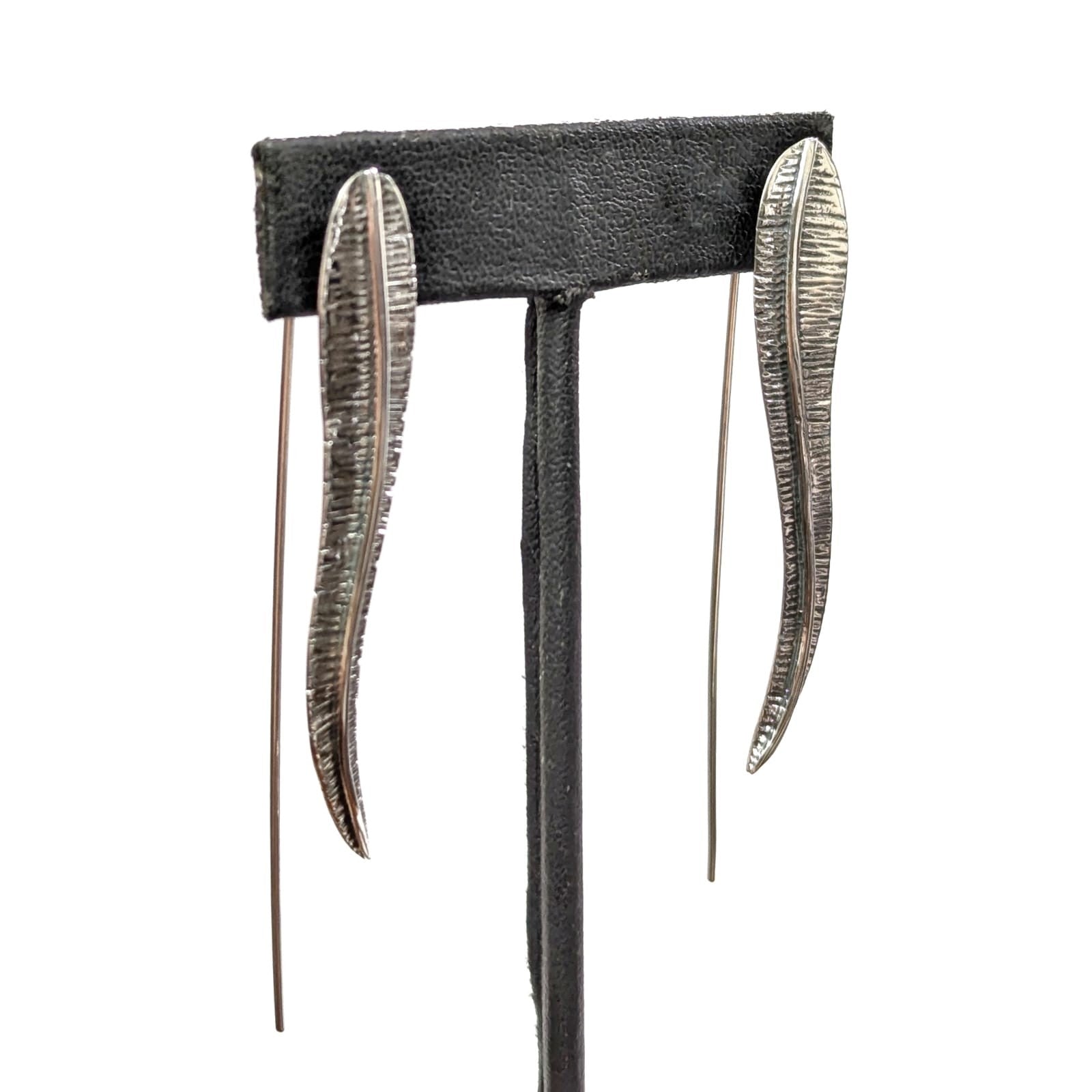 Aretes de pluma larga