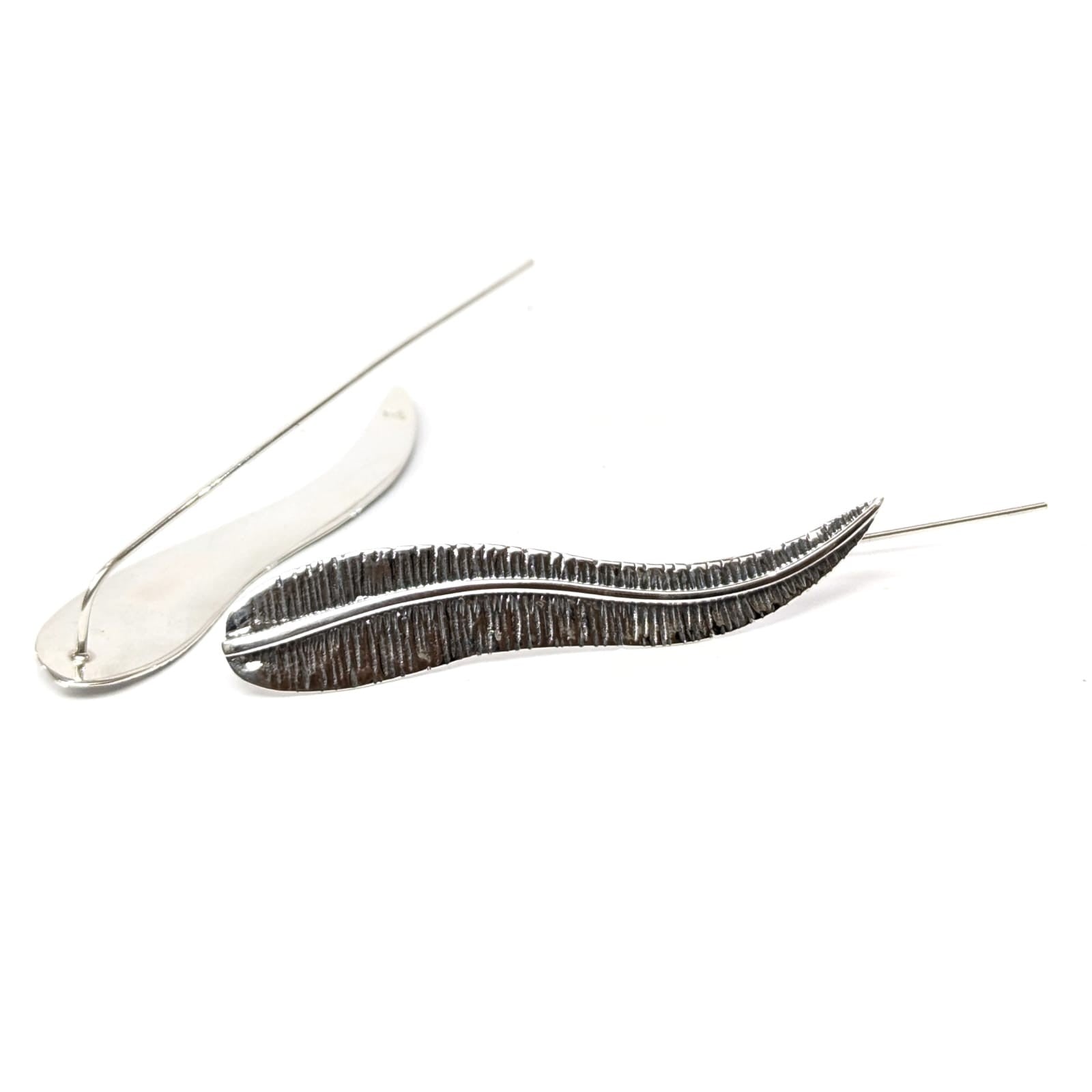 Aretes de pluma larga