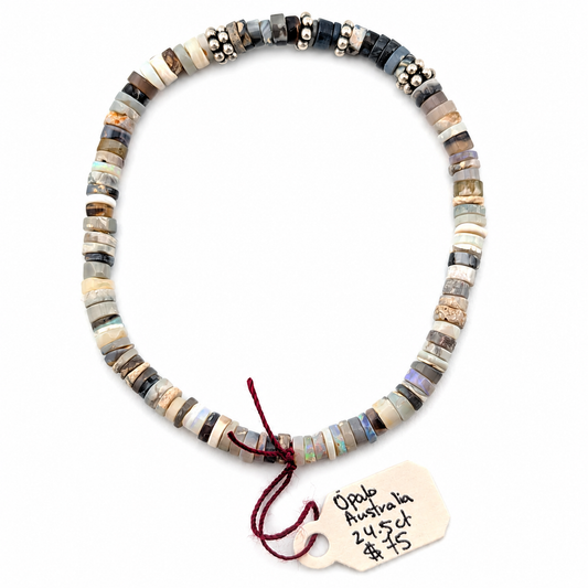 Pulsera elástica de ópalo negro australiano 24.5ct 4mm