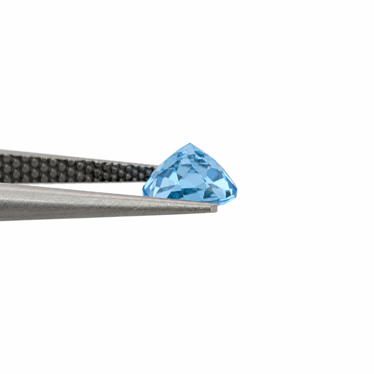 Topacio Azul Suizo Facetado Redondo 9 mm